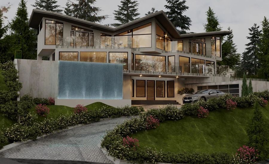 Modern residence at dusk with water feature