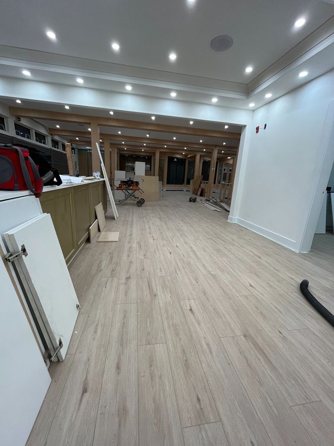 Vinyl plank flooring installation in progress